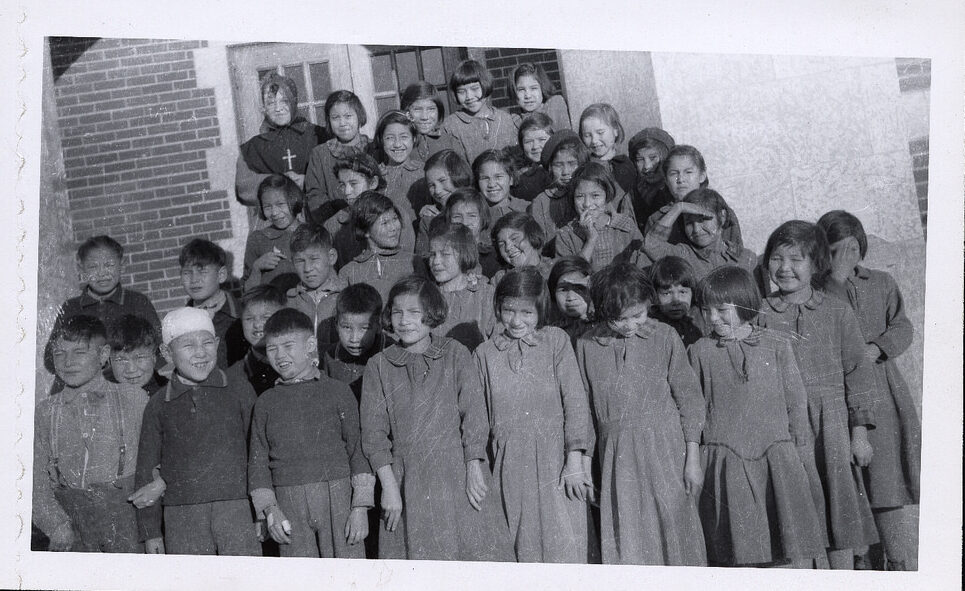 class photo of students at the Blue Quill residential school